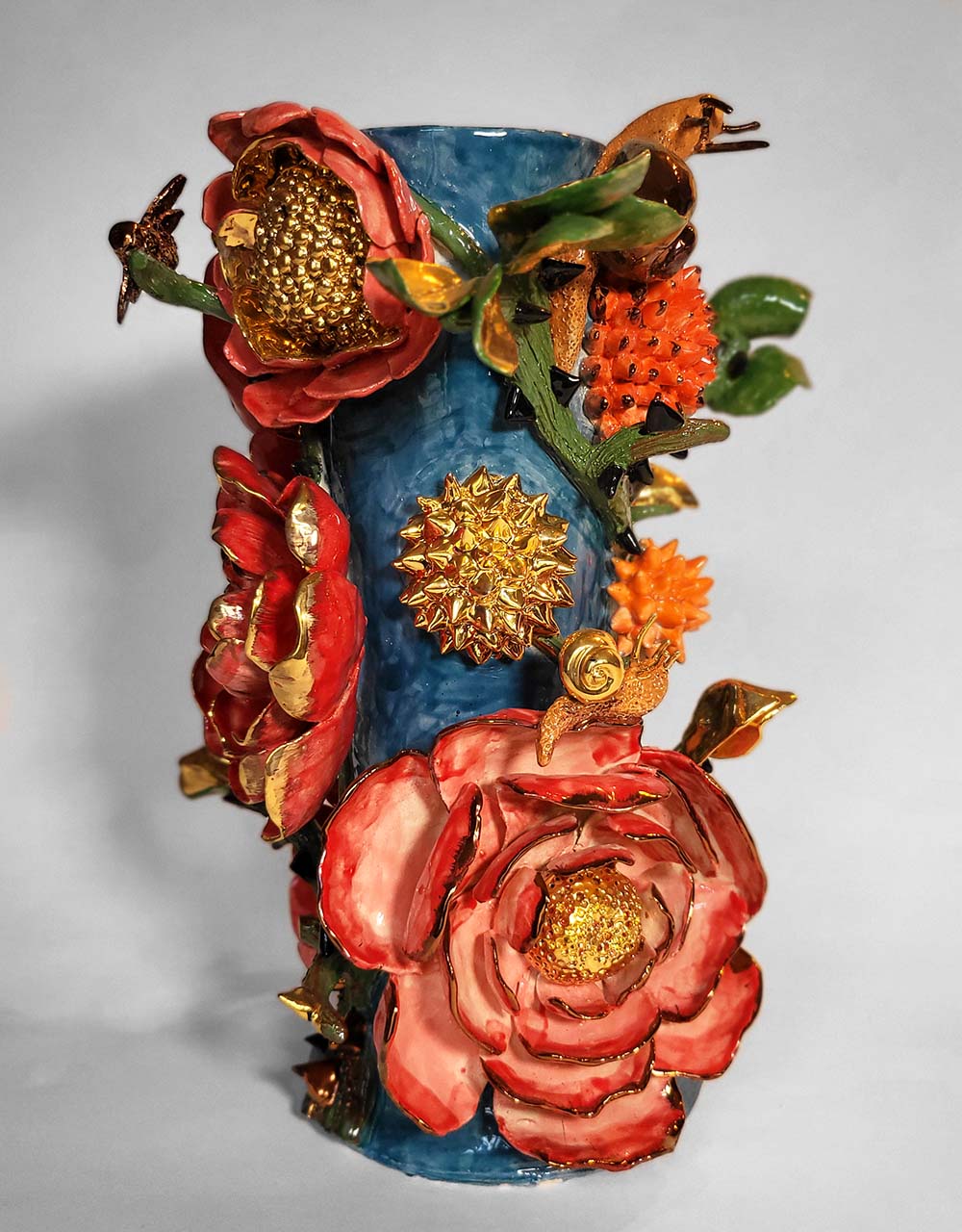 Enamelled earthenware candelabra gilded with fine 22-carat gold