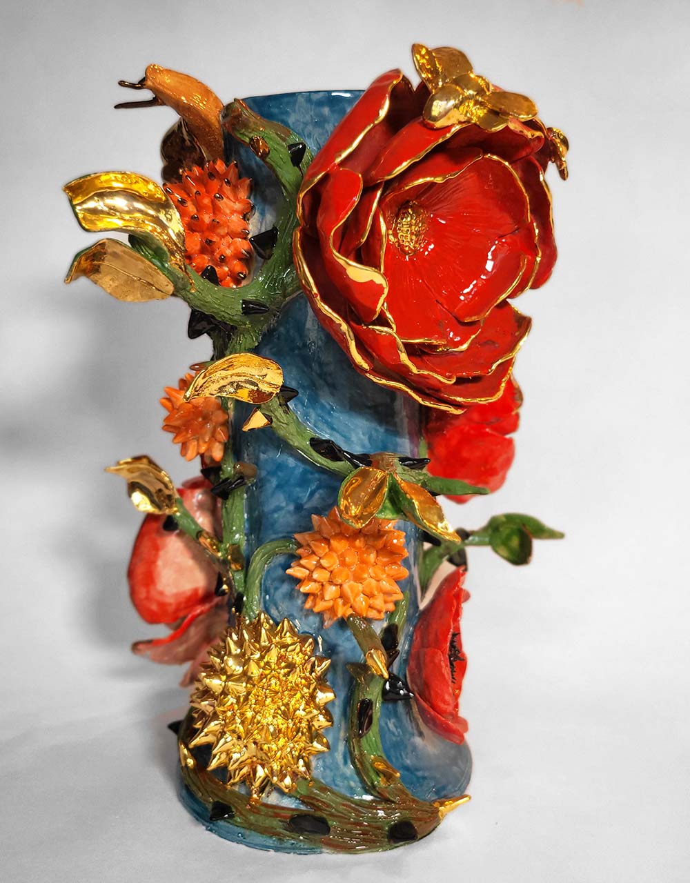 Enamelled earthenware candelabra gilded with fine 22-carat gold