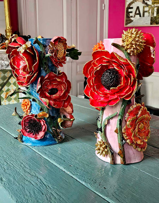 Pair of candelabras in enameled earthenware gilded with fine 22-carat gold